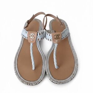 Chanel Women's white and light beige braided flats.